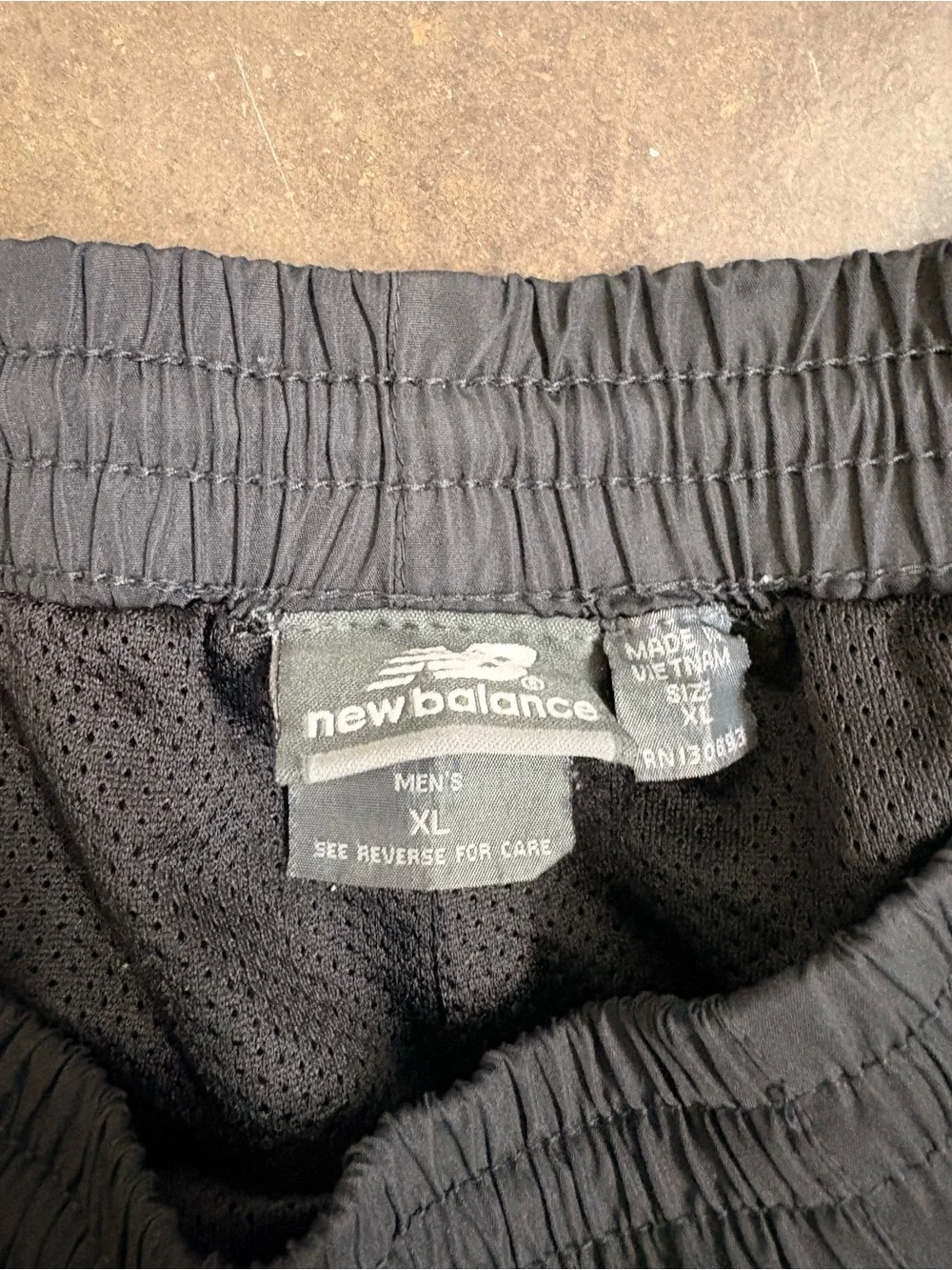 New Balance Men’s Black Track Pants with Zipper Hems